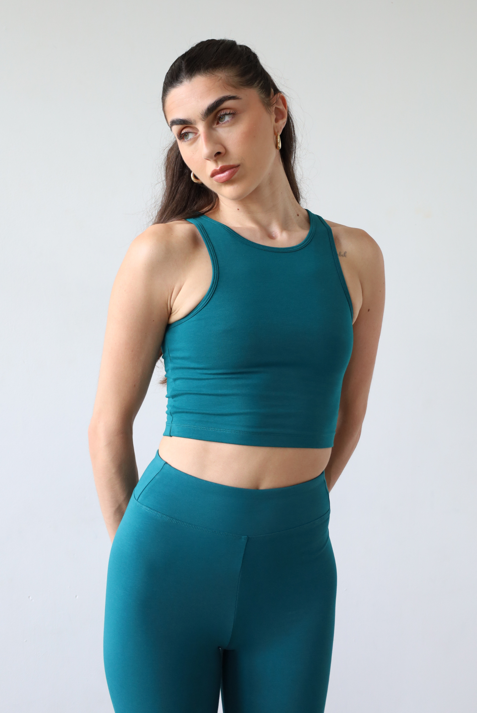 Organic Cotton teal leggings, front
