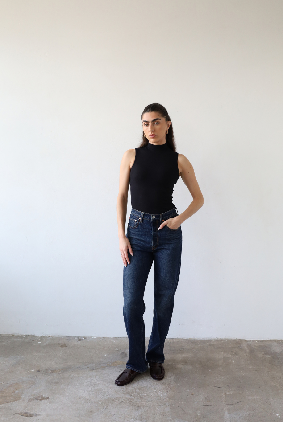 Organic cotton sleeveless turtleneck top, black, front