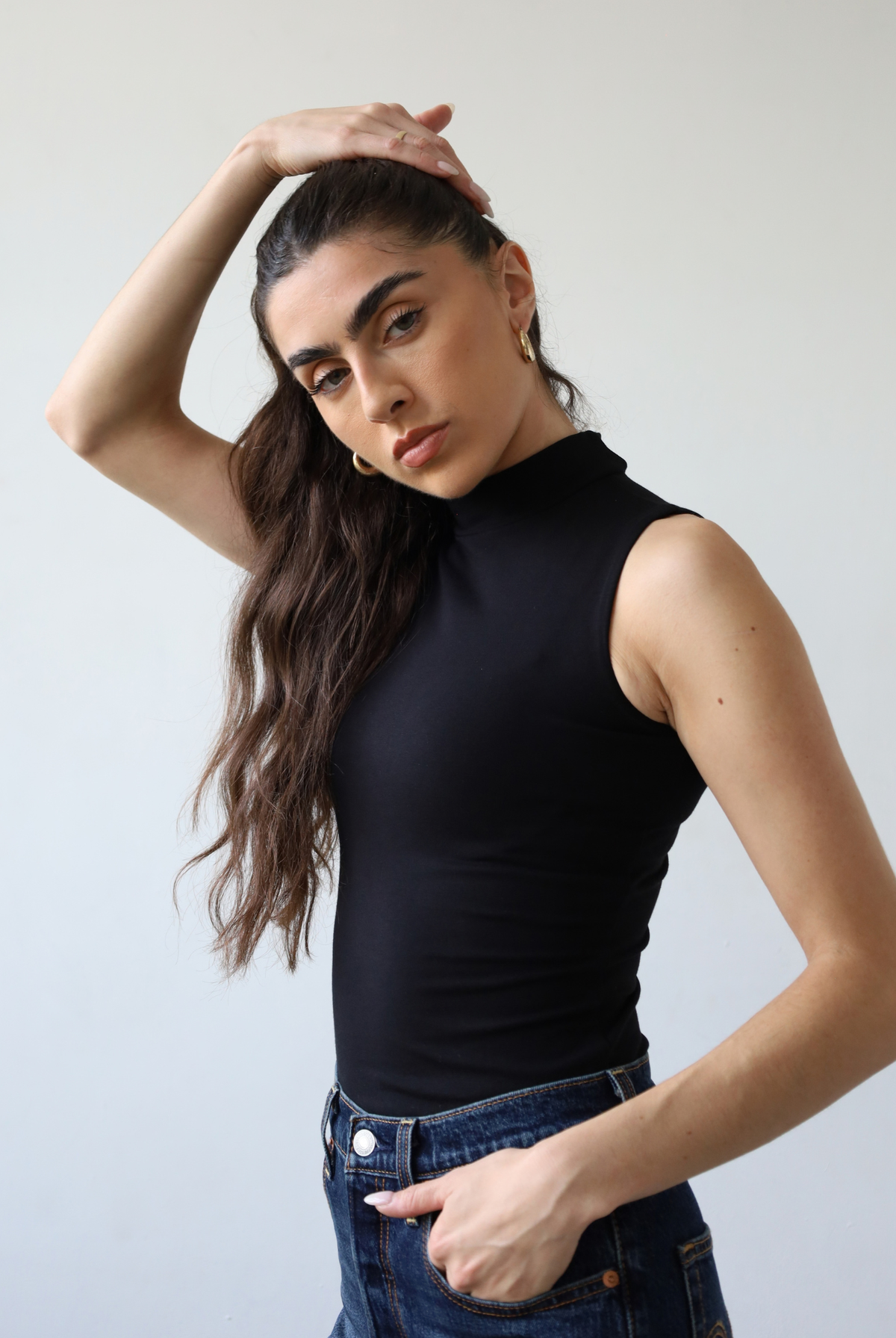 Organic cotton sleeveless turtleneck top, black, front