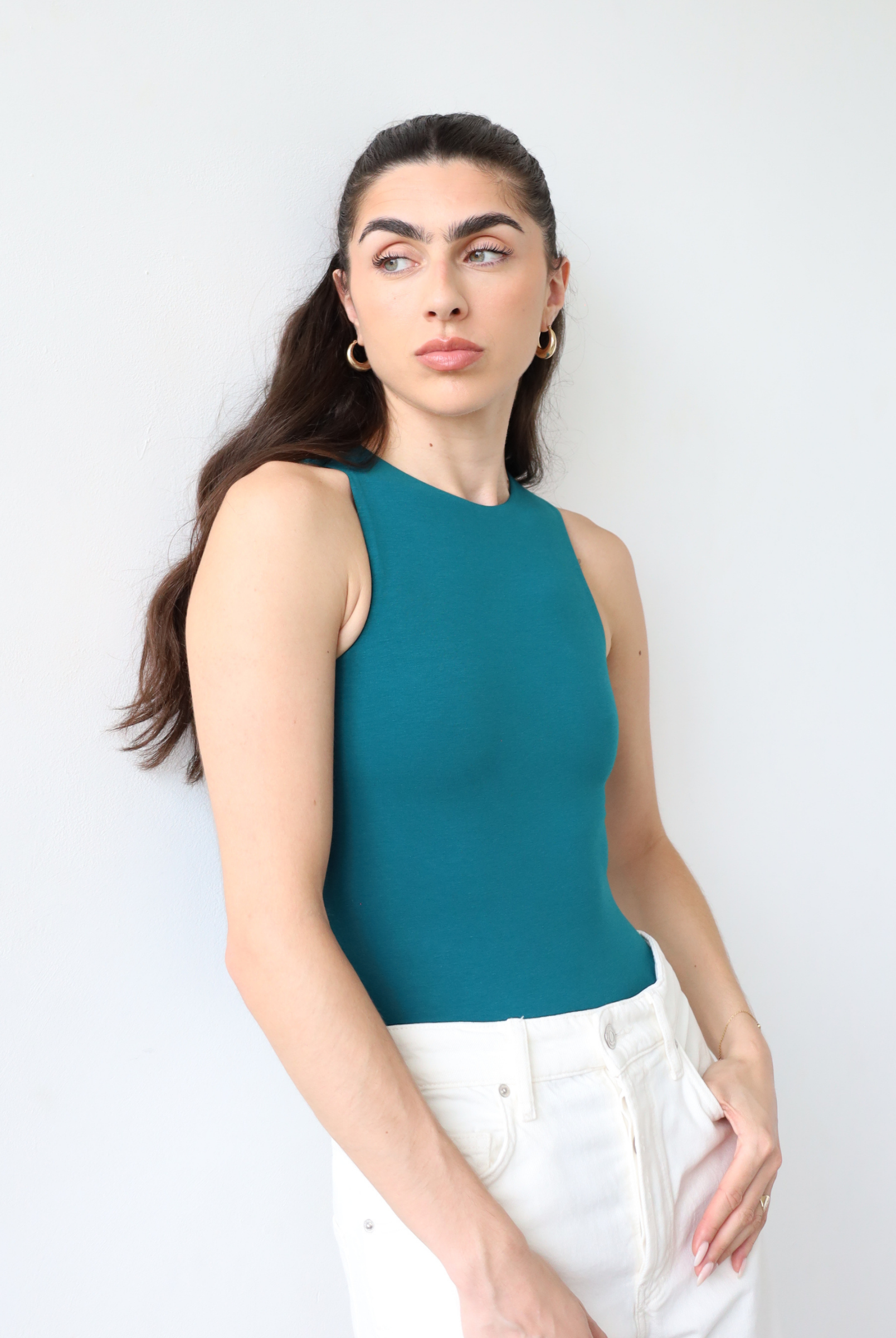 Organic cotton teal sleeveless bodysuit, front