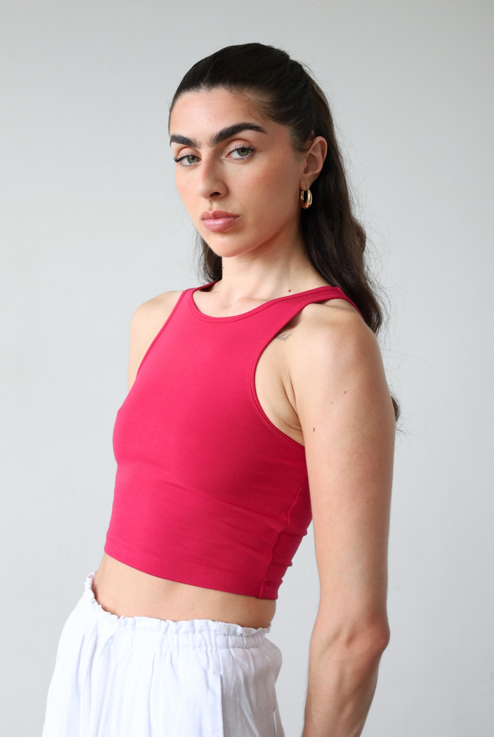 Organic cotton pink crop tank top, front