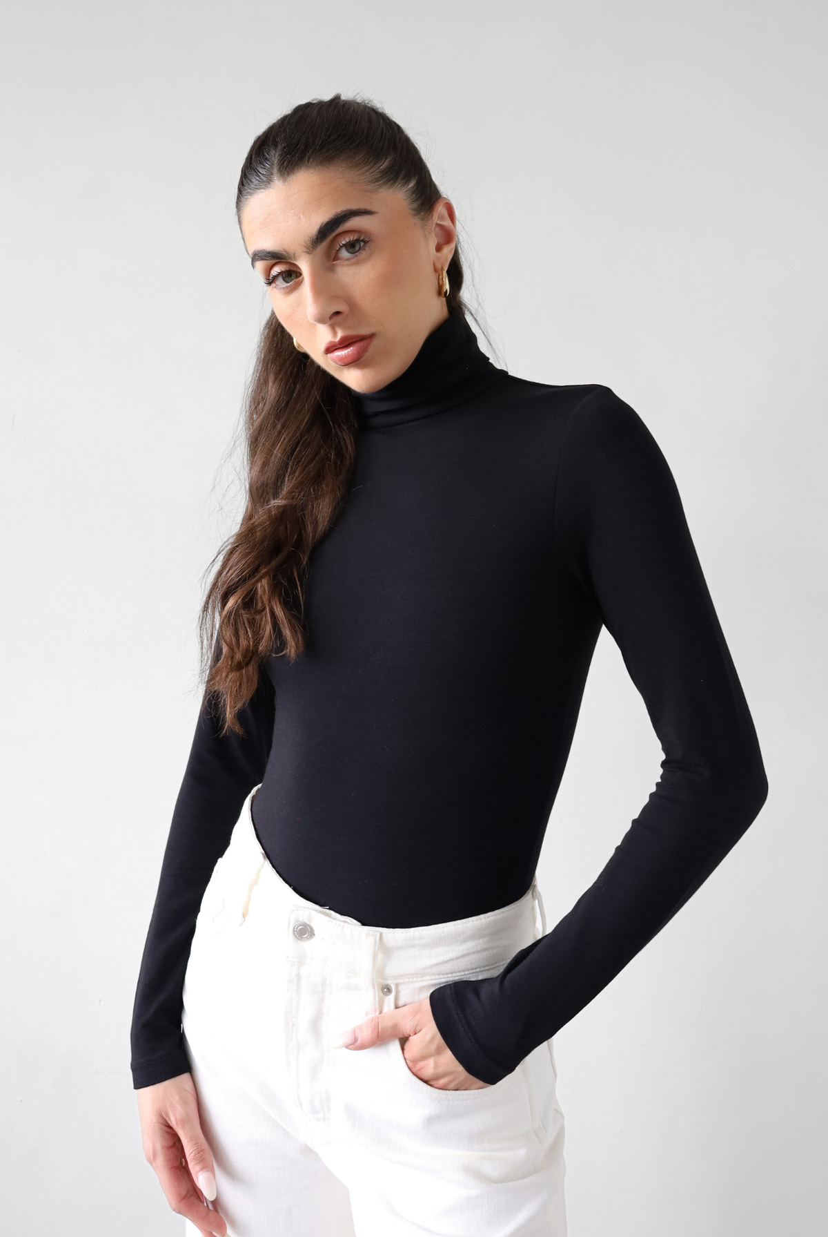 Organic cotton black roll neck long sleeve bodysuit, front