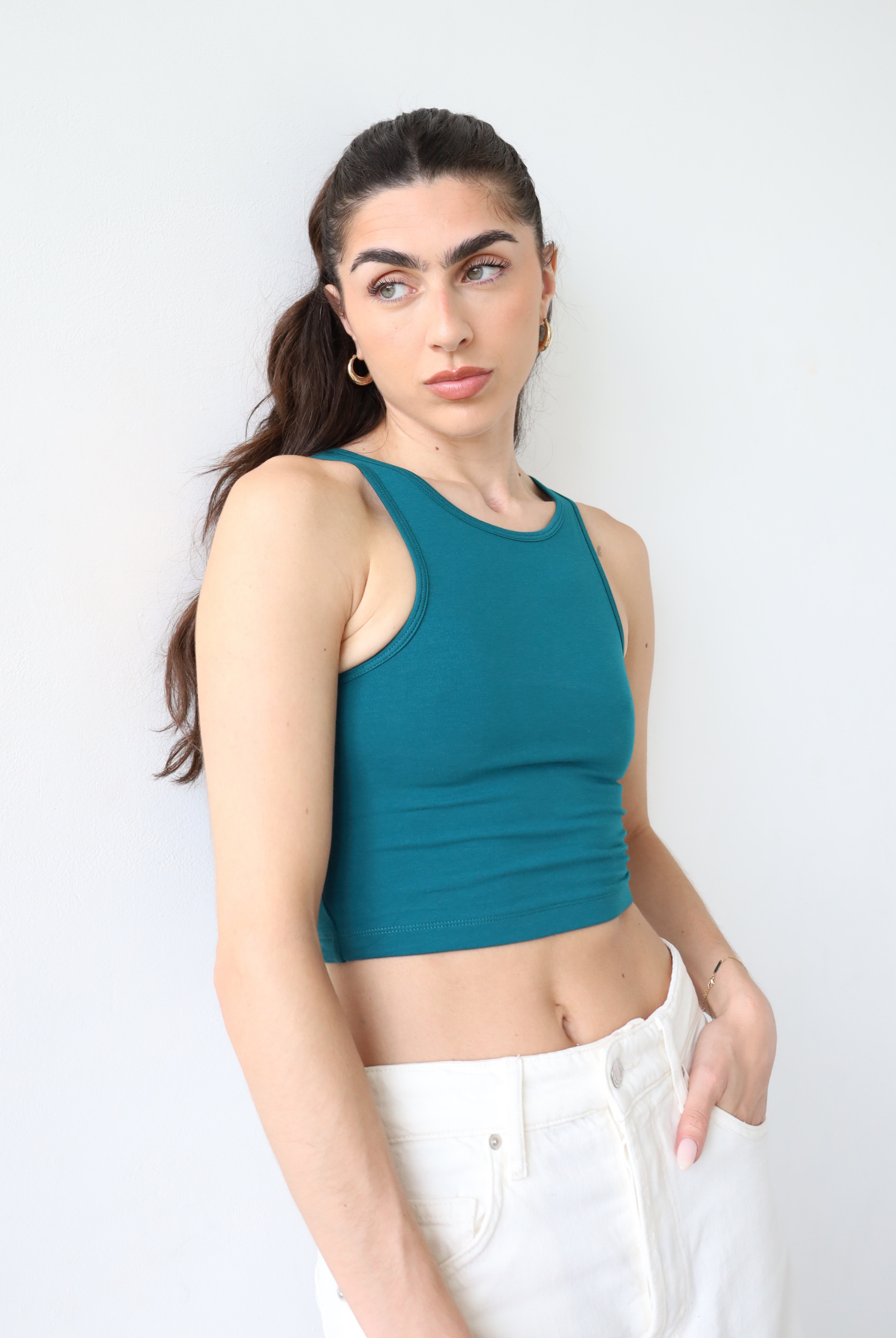 Organic cotton teal high neck tank top, front