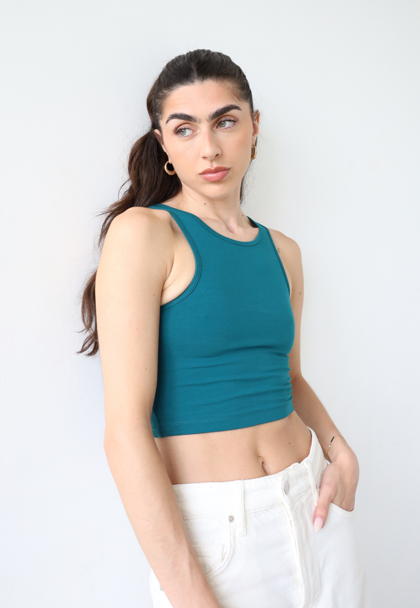 Organic cotton teal high neck tank top, front