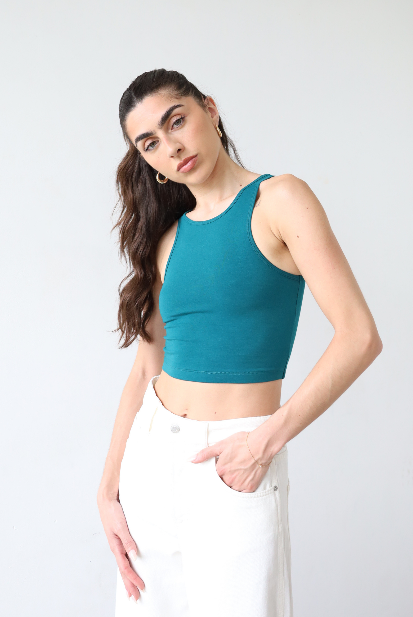Organic cotton teal high neck tank top, front