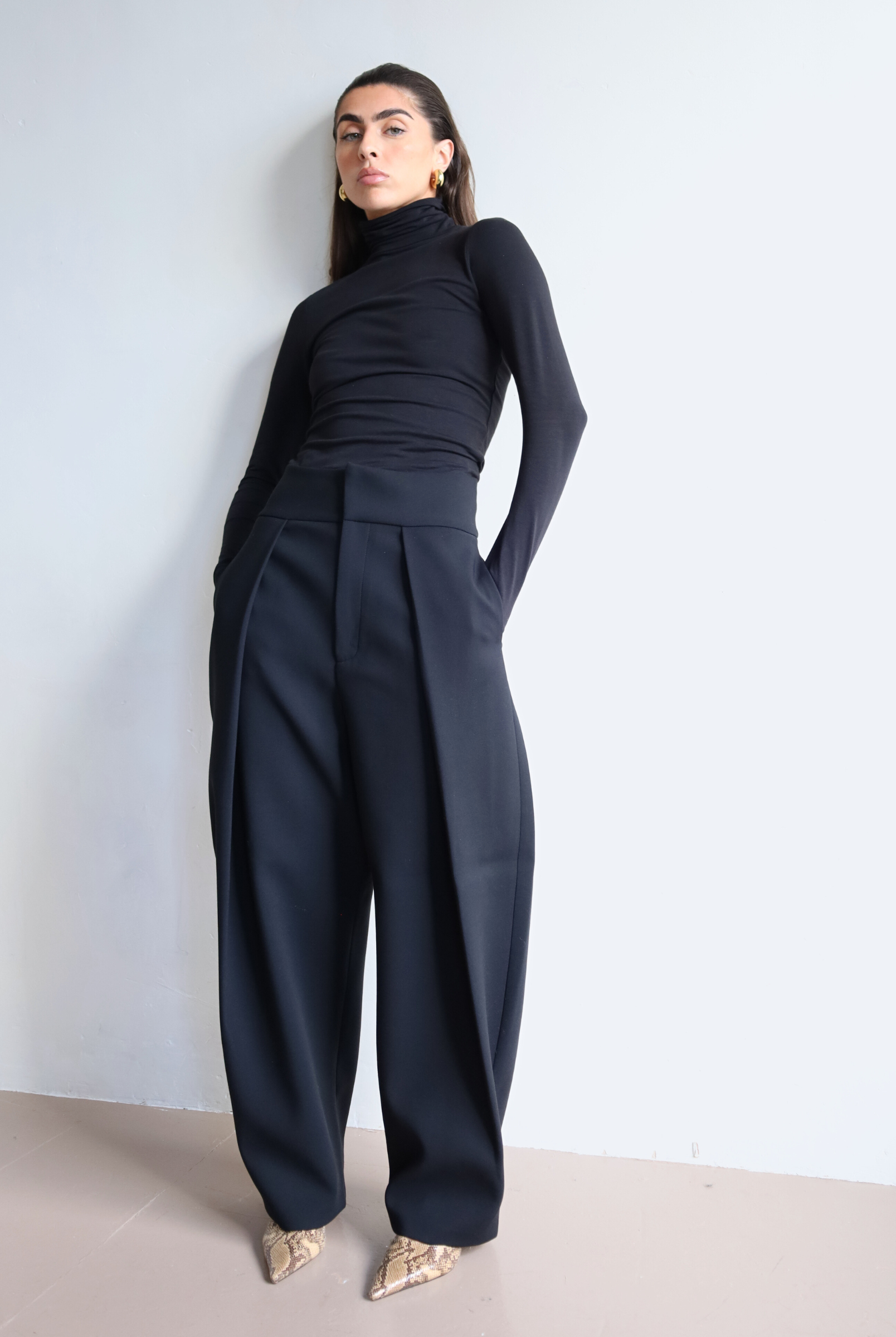 Women's black organic cotton long sleeve roll neck t-shirt - front