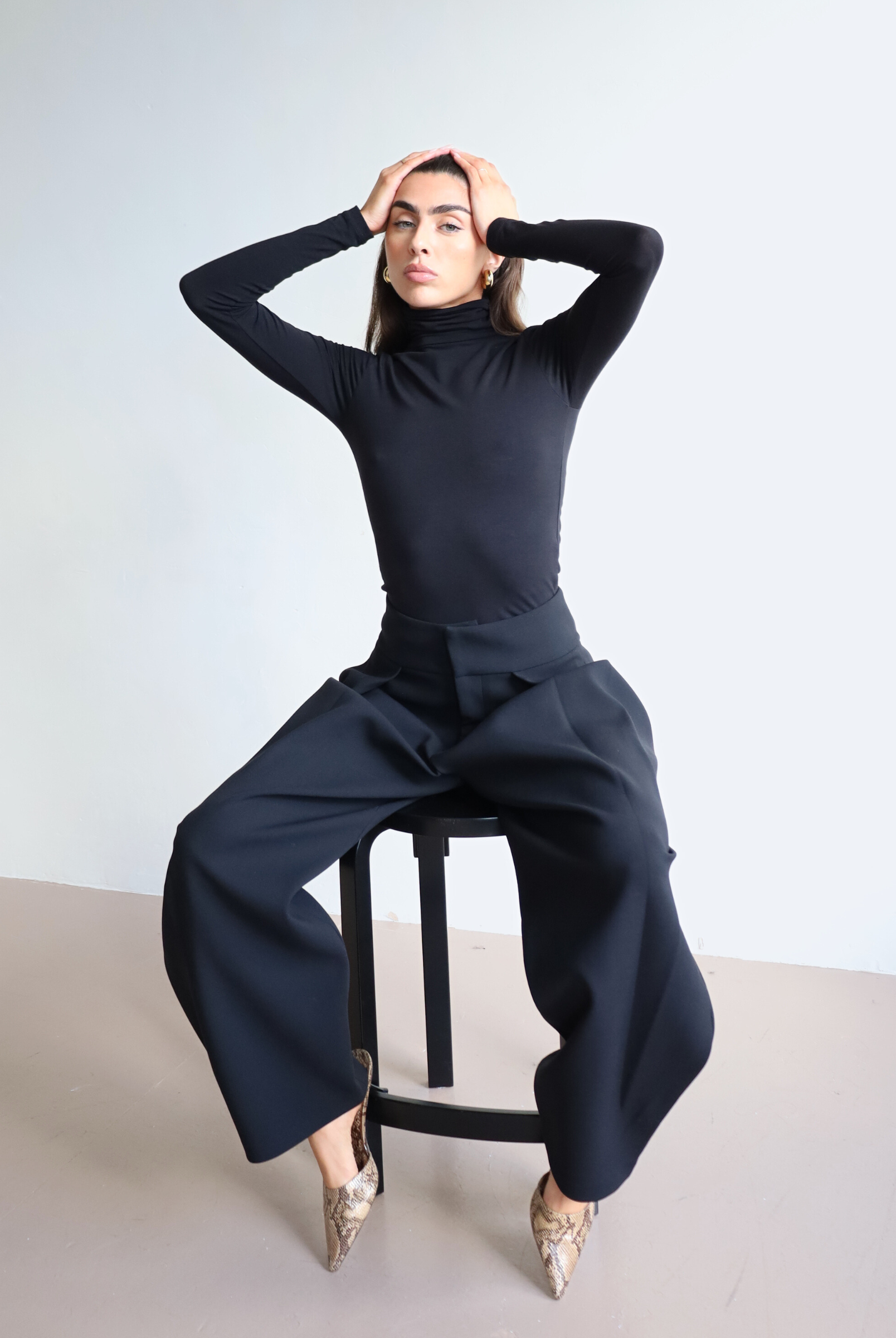 Women's black organic cotton long sleeve roll neck t-shirt - front