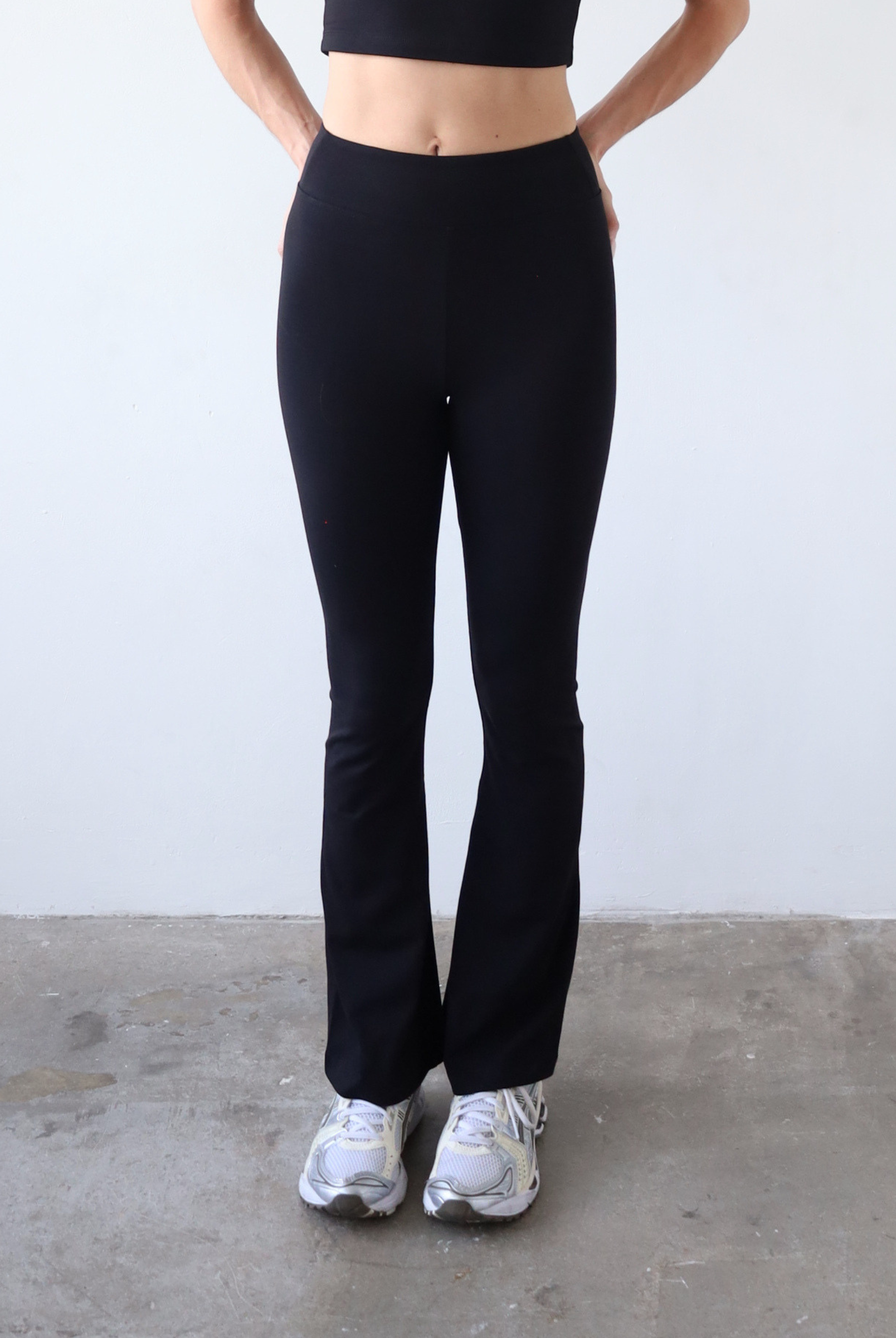 Organic cotton black flared leggings, front