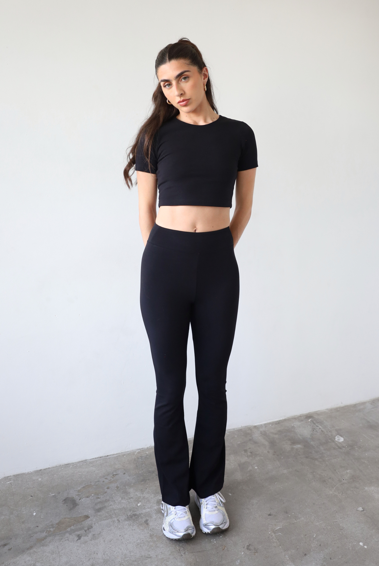 Organic cotton black flared leggings, front