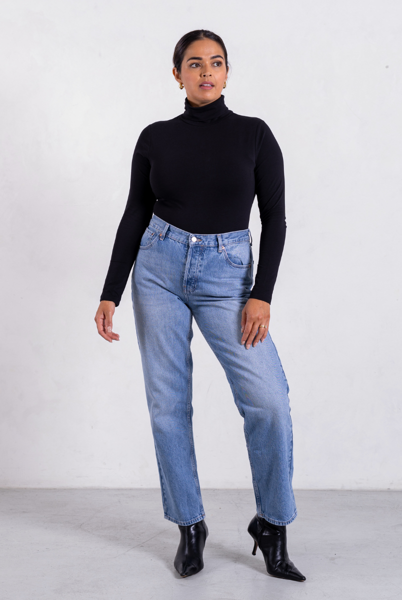 styled image of black organic cotton roll neck long sleeve bodysuit