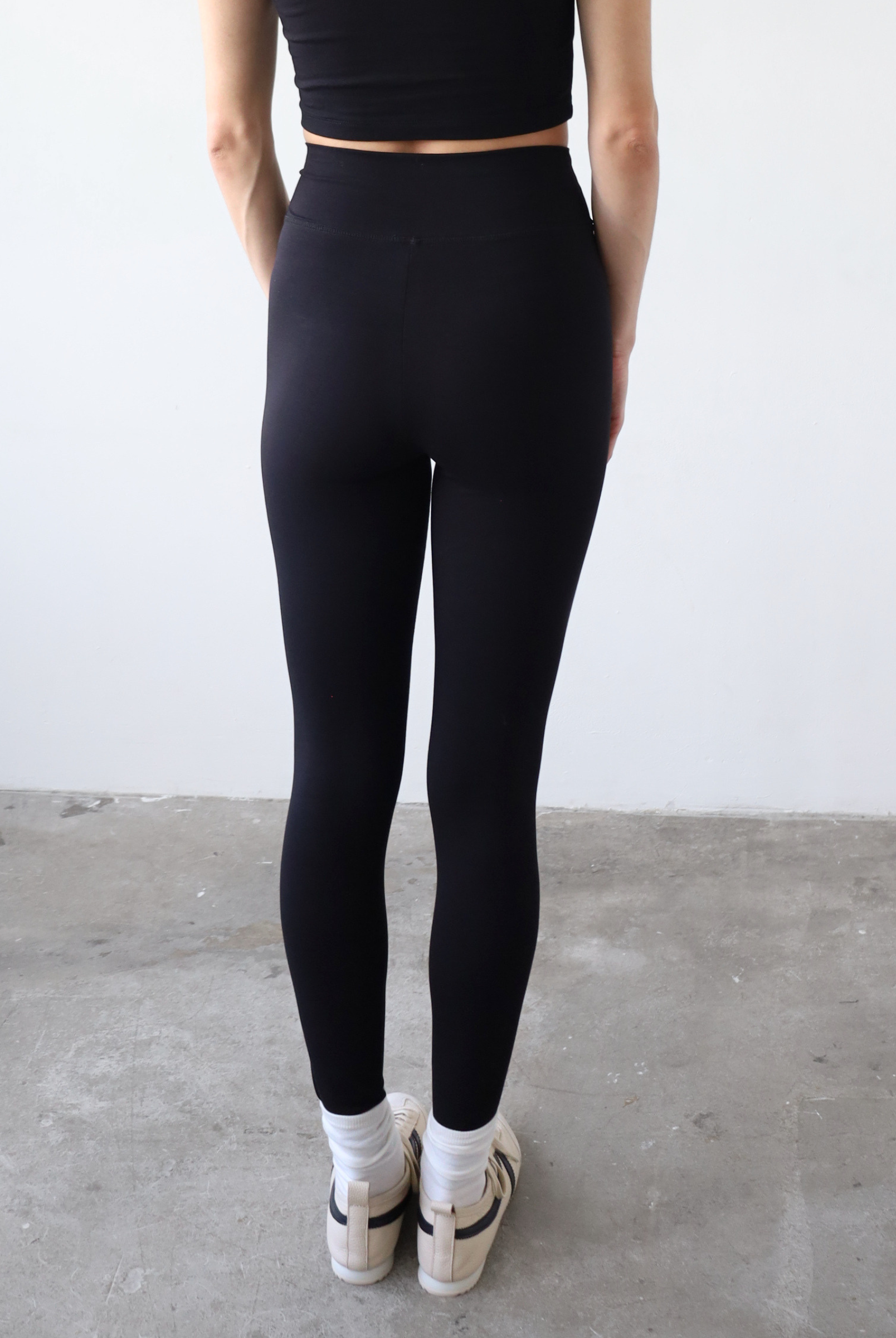 Organic cotton black wrap waist leggings, back