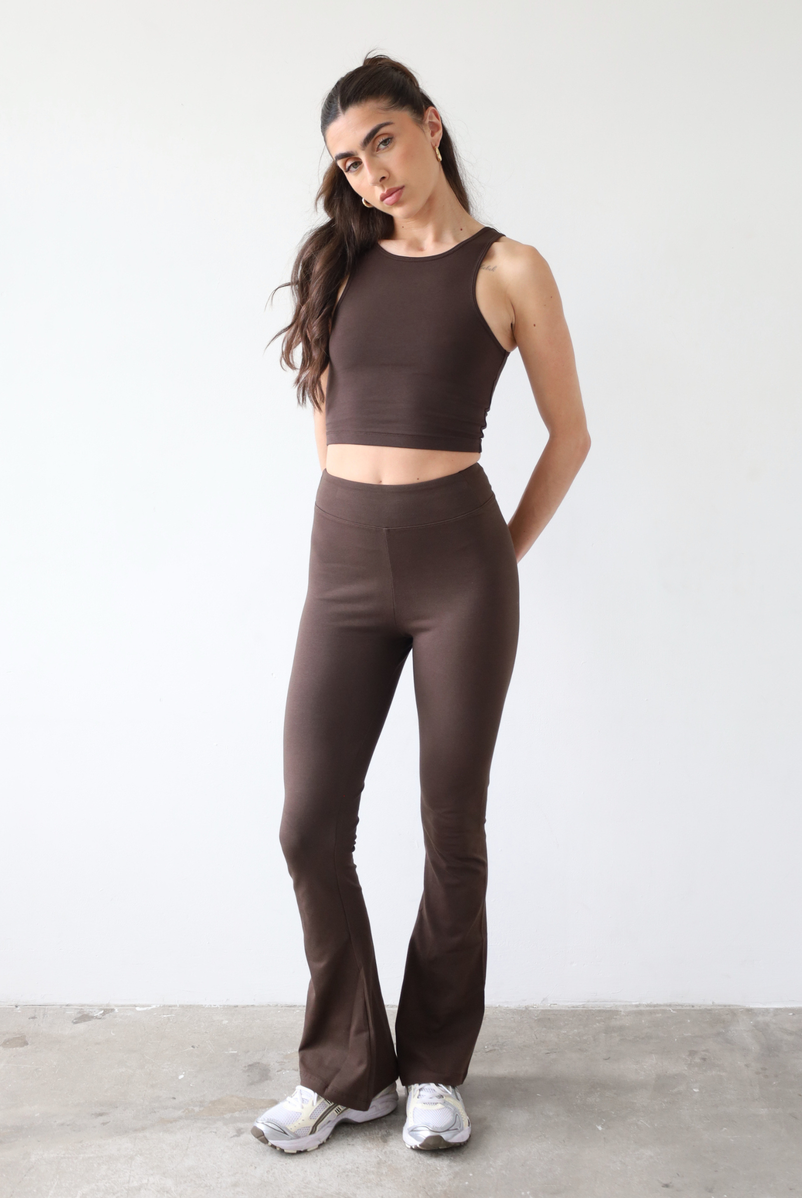 Organic cotton flared dark brown leggings, front
