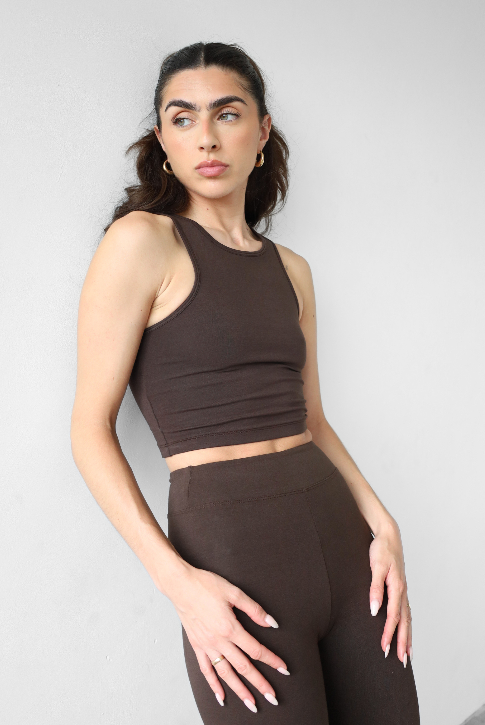 organic cotton dark brown leggings on model, front