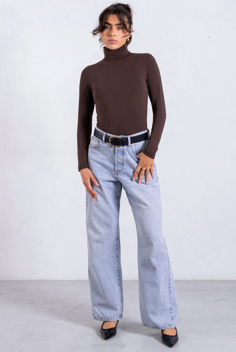 styled image of brown organic cotton roll neck long sleeve bodysuit