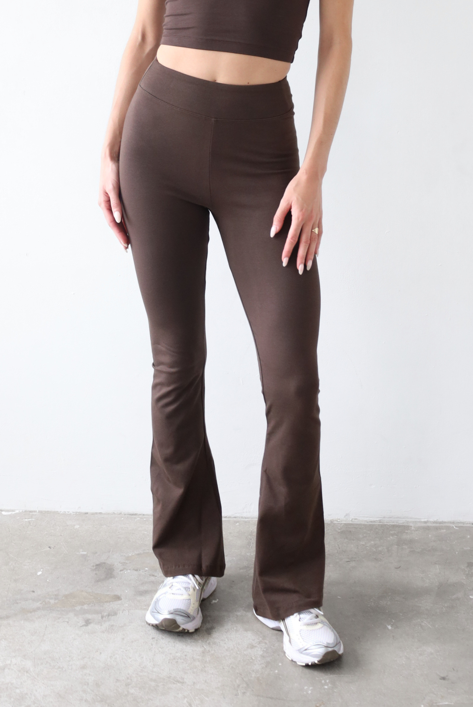 Organic cotton flared dark brown leggings, front