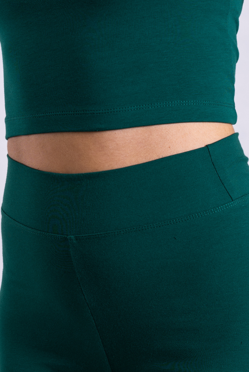 close up of green organic cotton leggings