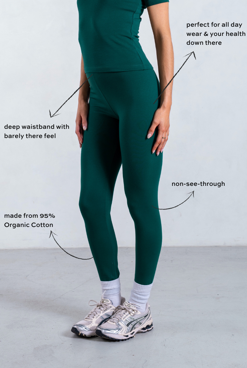 side of green organic cotton leggings