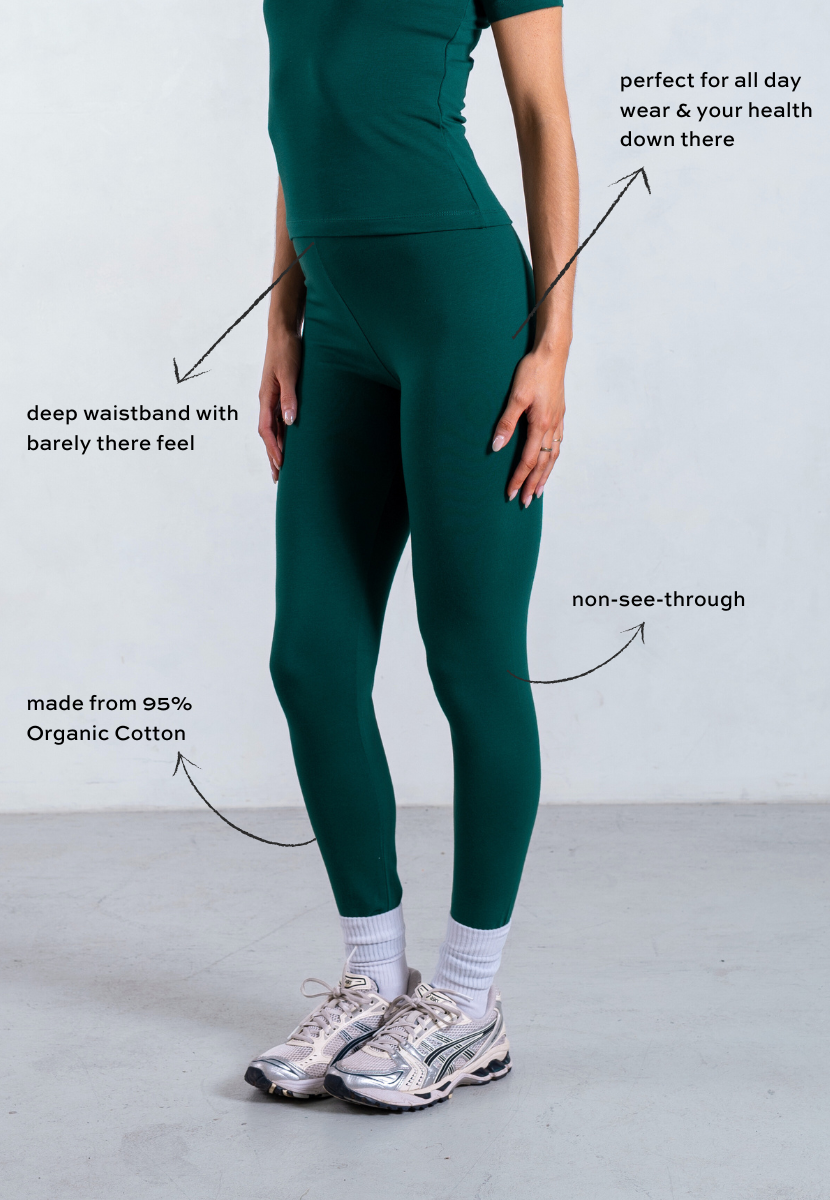 side of green organic cotton leggings
