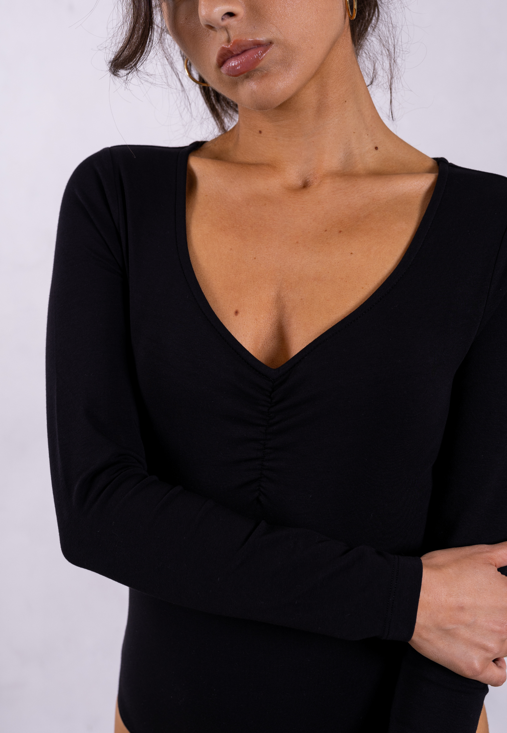 close up of black organic cotton sweetheart bodysuit