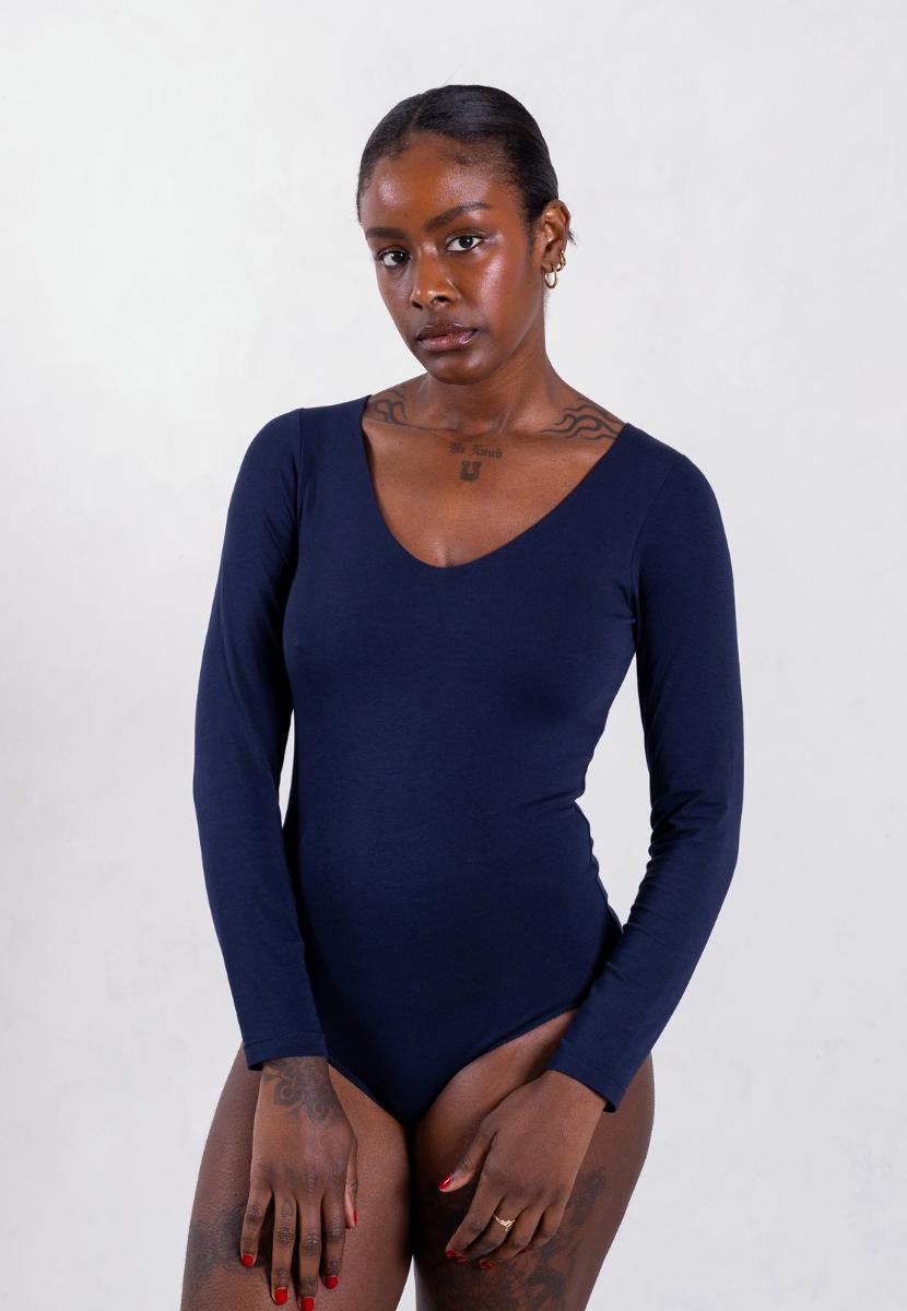 front of navy blue organic cotton v-neck long sleeve bodysuit