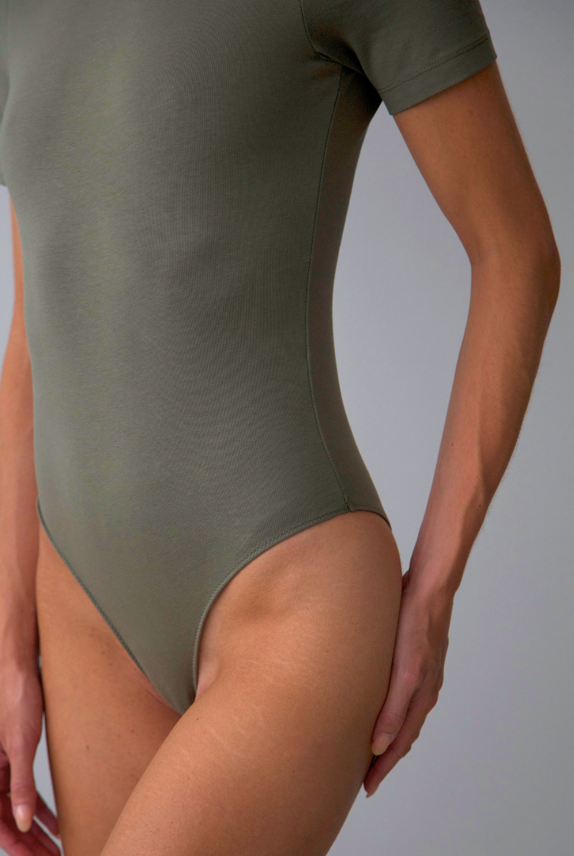 organic cotton crew neck bodysuit, burnt olive, brief close up