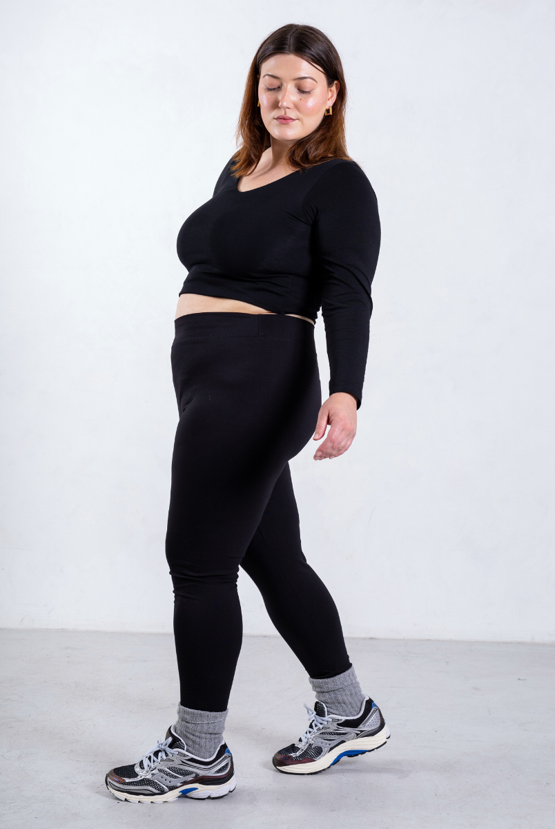 side of black organic cotton leggings