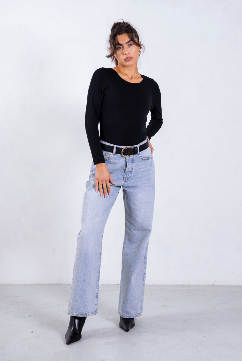 styled image of black organic cotton long sleeve bodysuit