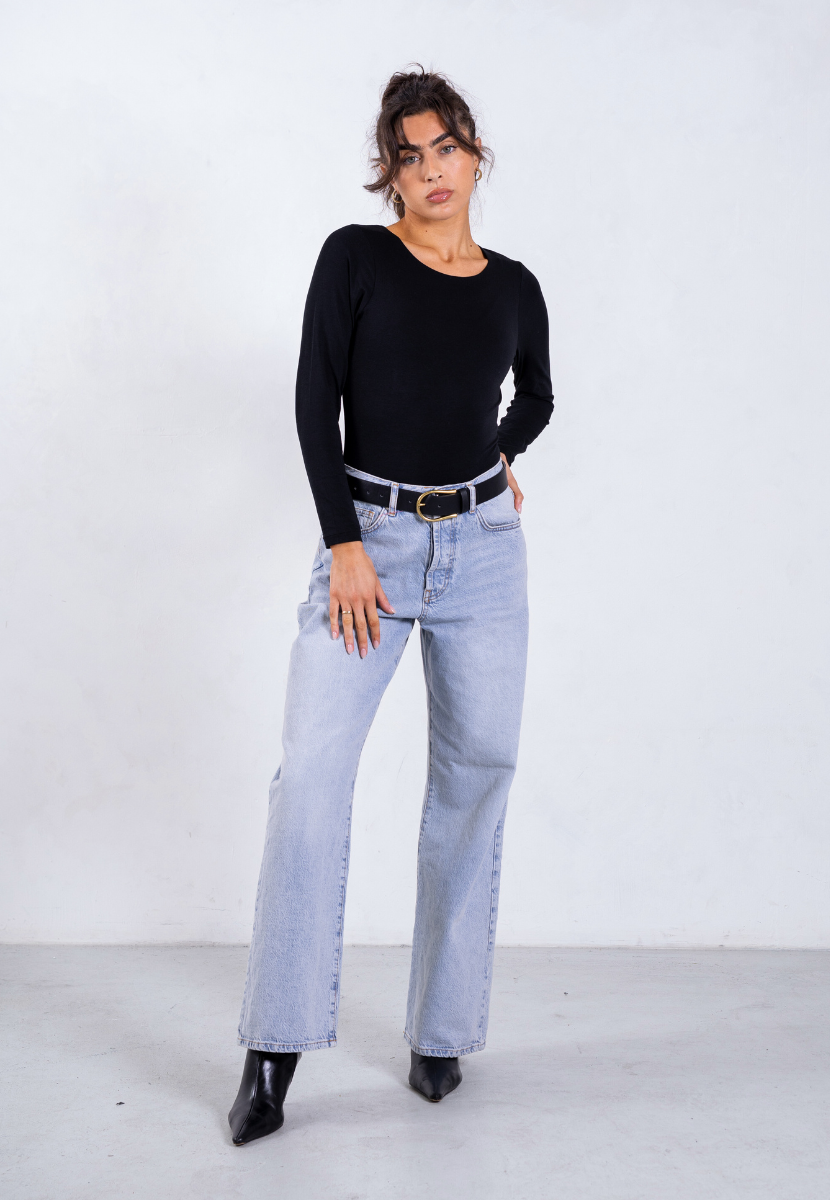 styled image of black organic cotton long sleeve bodysuit