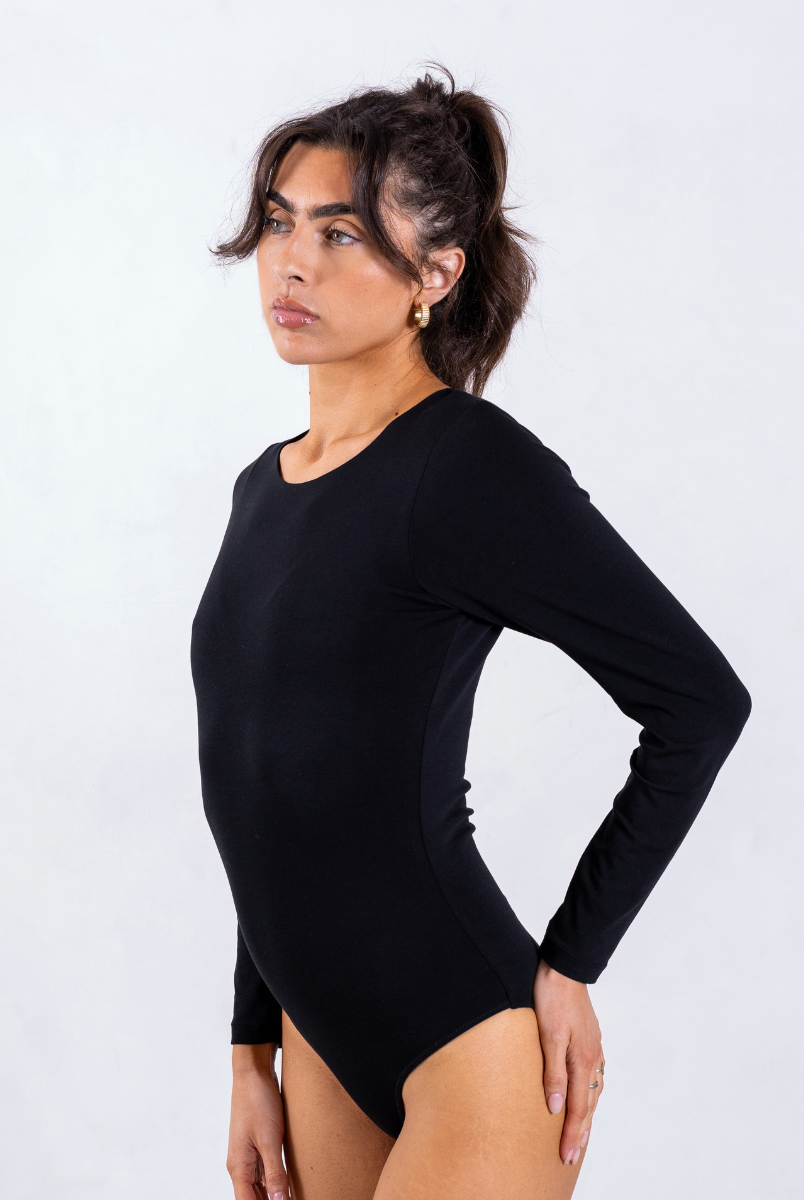 side of black organic cotton long sleeve bodysuit