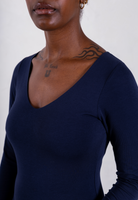 close up of navy blue organic cotton v-neck long sleeve bodysuit