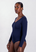 side of navy blue organic cotton v-neck long sleeve bodysuit