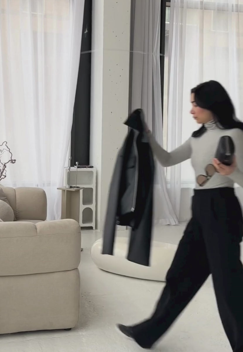 styling video of grey organic cotton roll neck long sleeve bodysuit