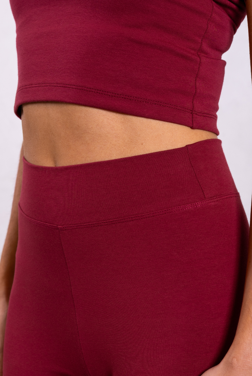 close up of red organic cotton leggings