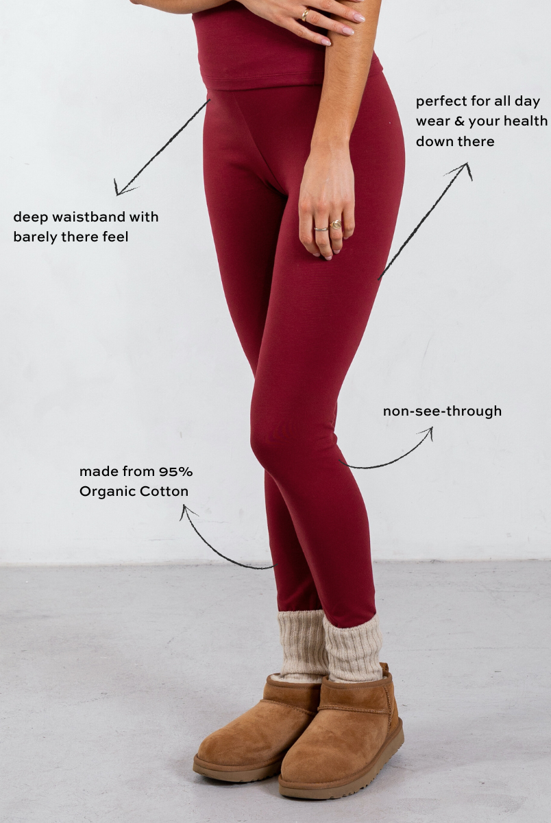 side of red organic cotton leggings