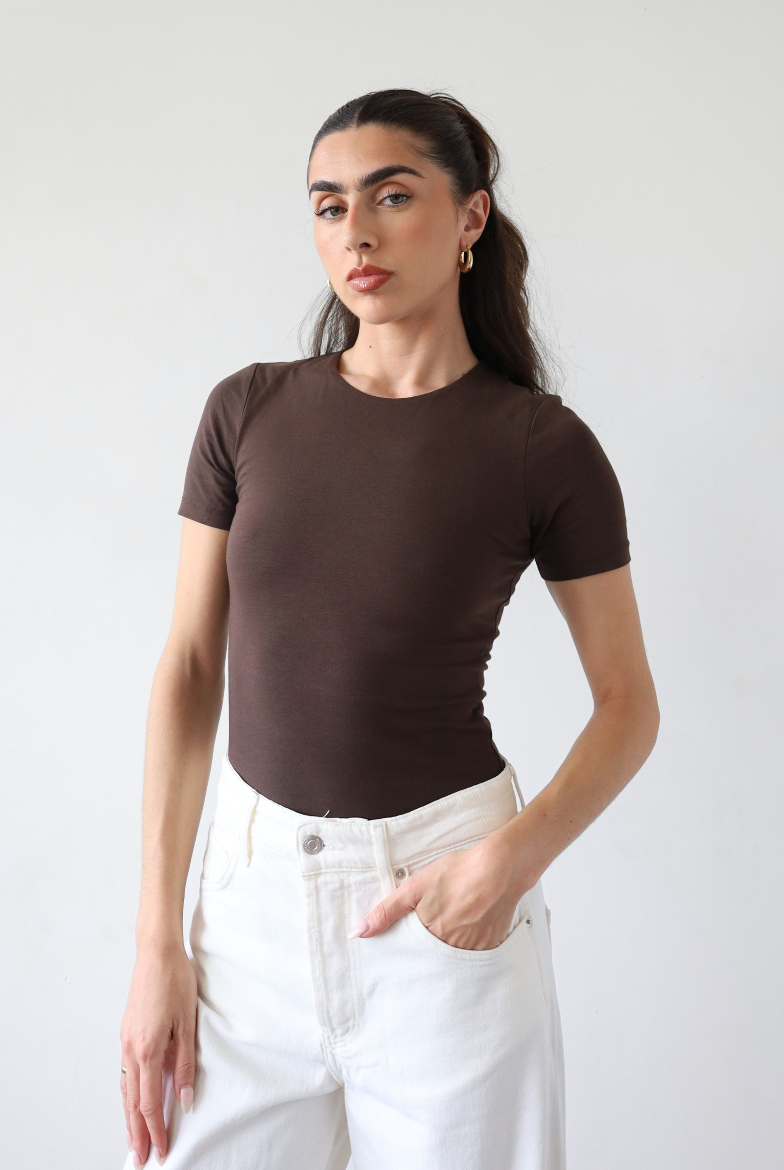 Organic cotton short sleeve brown crew neck bodysuit, front