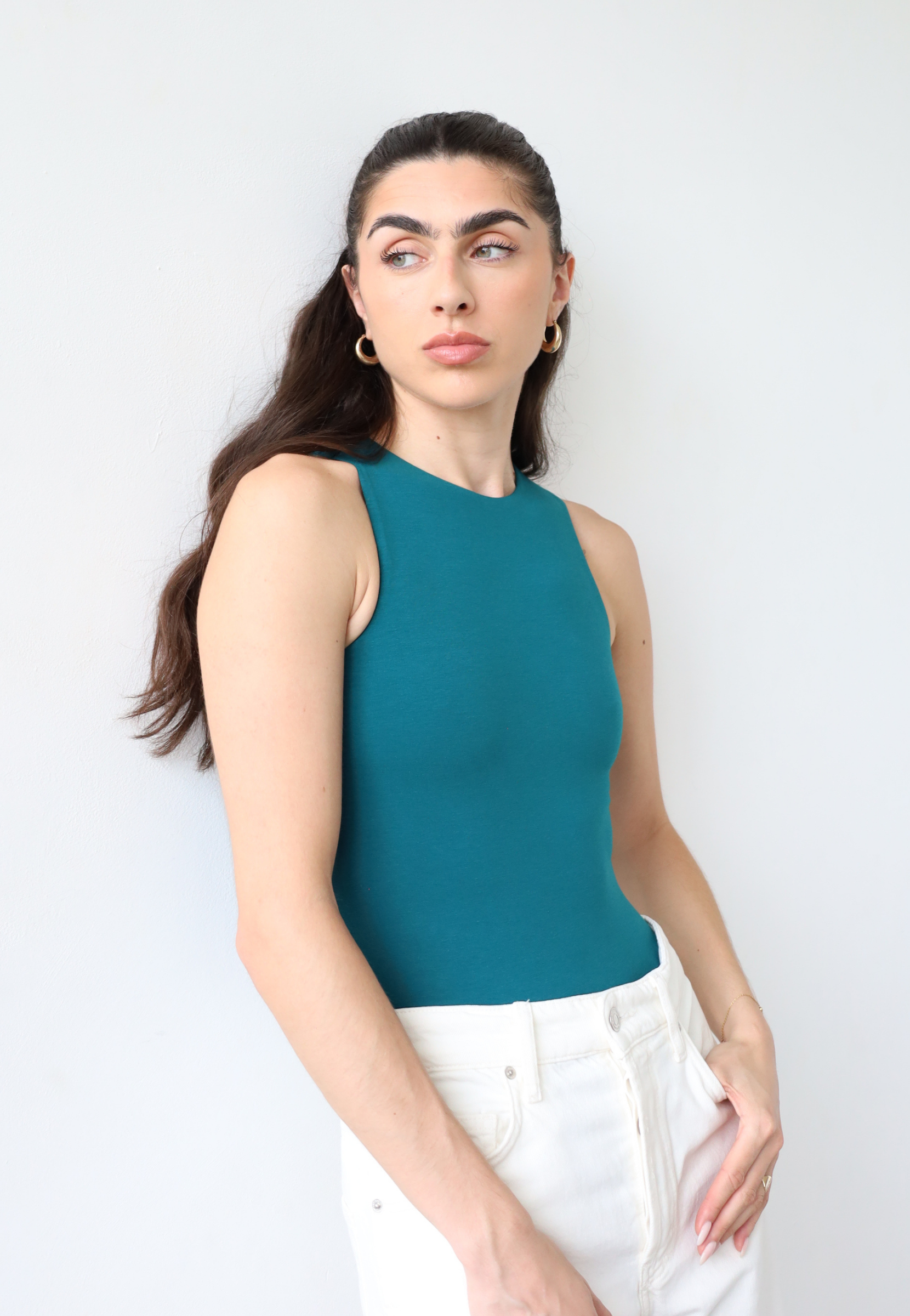 Organic cotton teal sleeveless bodysuit, front