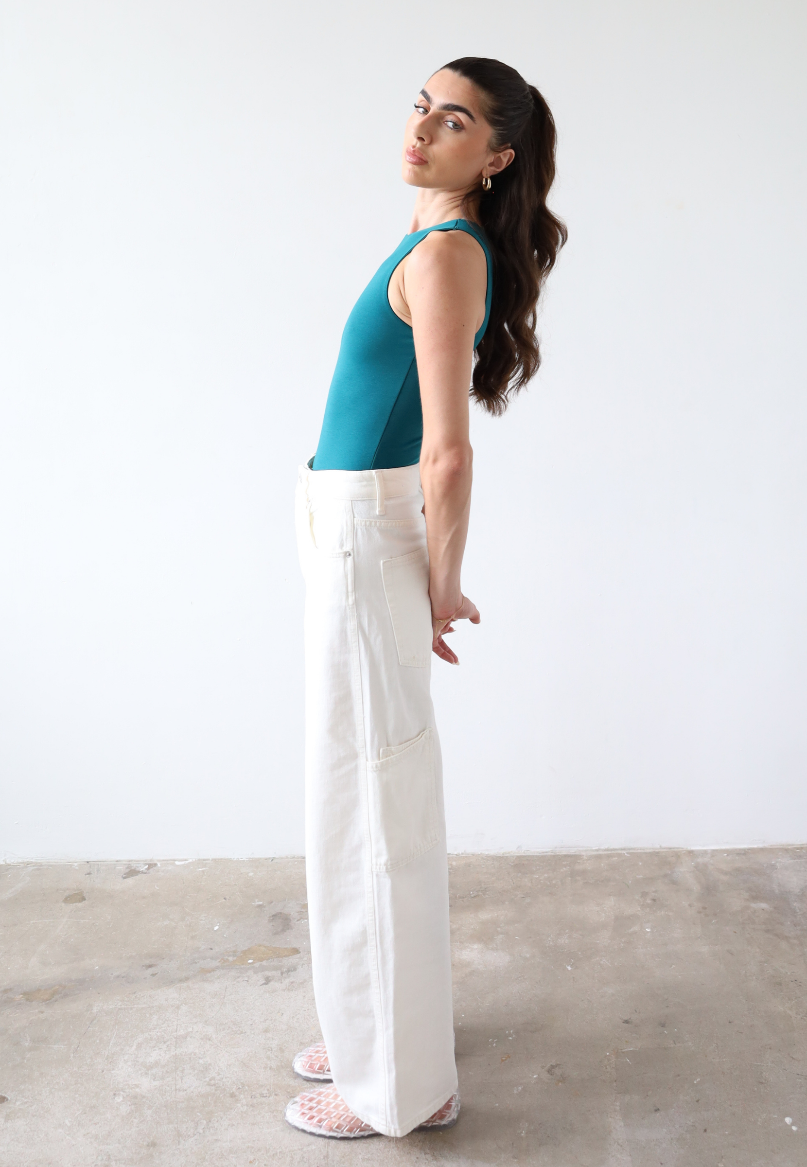Organic cotton teal sleeveless bodysuit, side