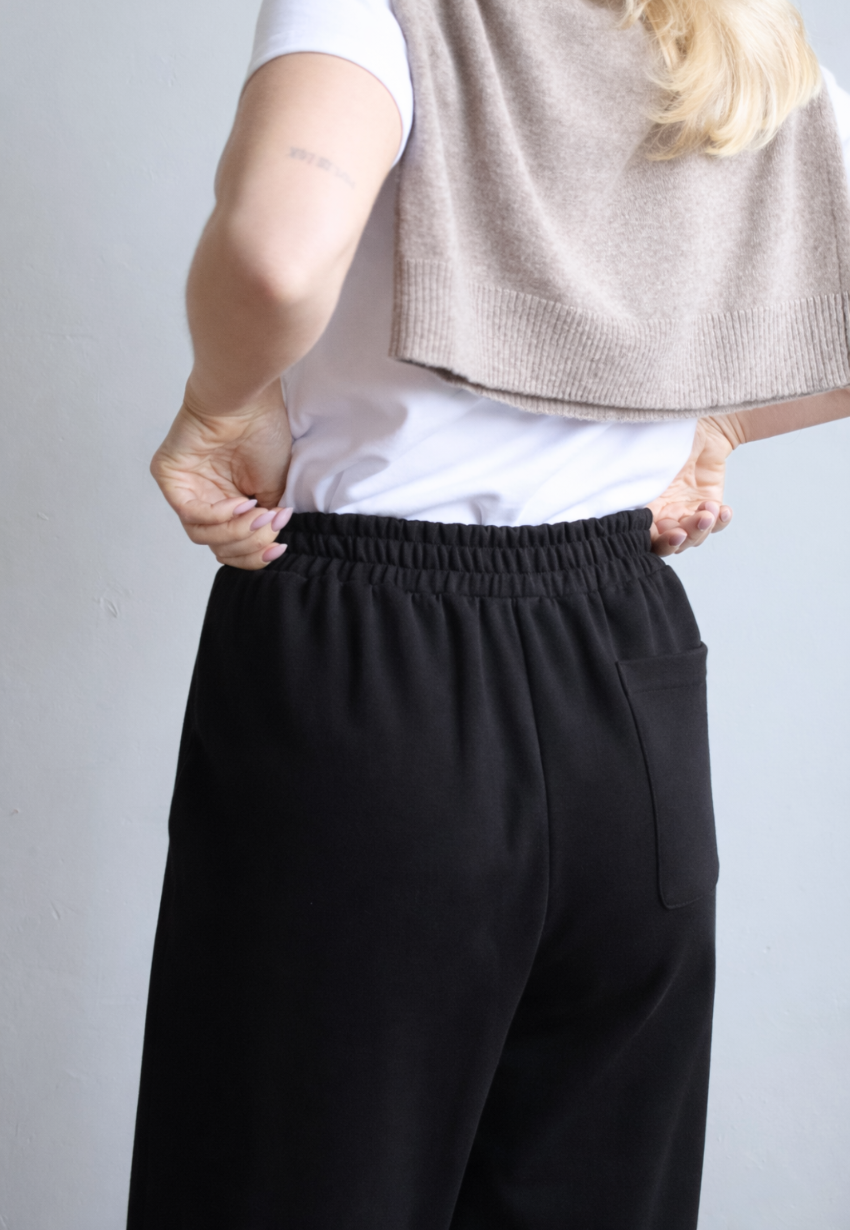 Black organic cotton wide leg trousers, back