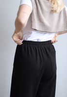 Black organic cotton wide leg trousers, back