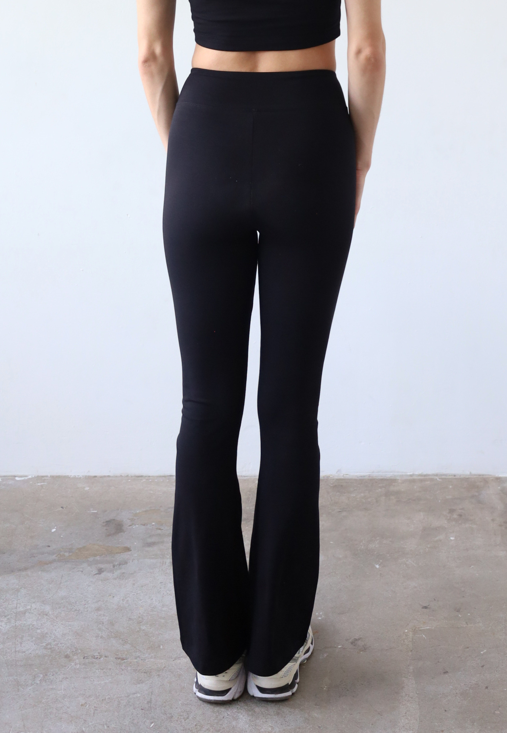 Organic cotton black flared leggings, back 