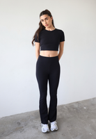 Organic cotton black flared leggings, front 