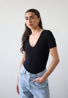 Organic cotton black v-neck short sleeve bodysuit, front 