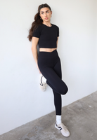 Organic cotton black wrap waist leggings, front