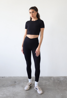 Organic cotton black wrap waist leggings, front 
