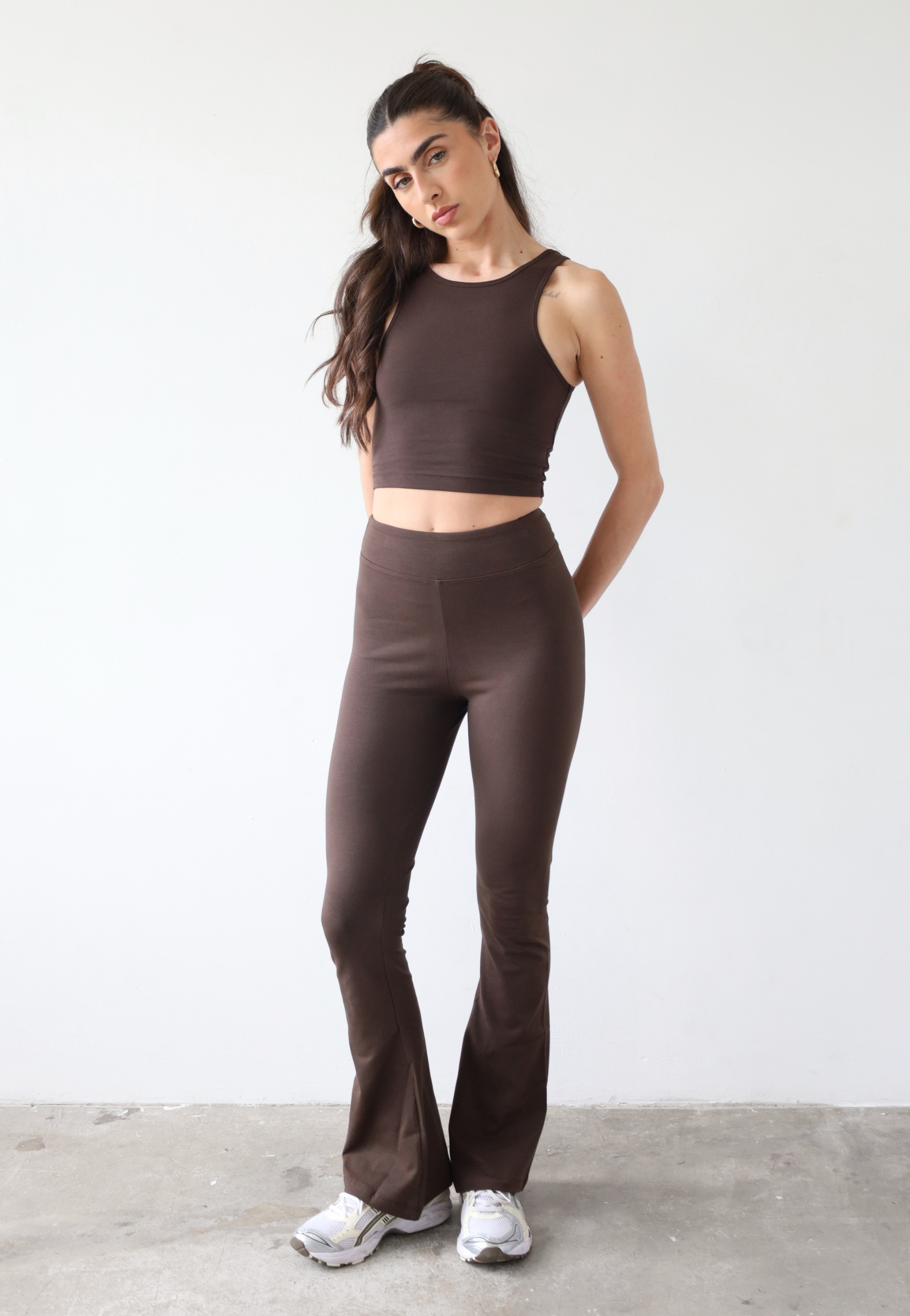 Organic cotton flared dark brown leggings, front