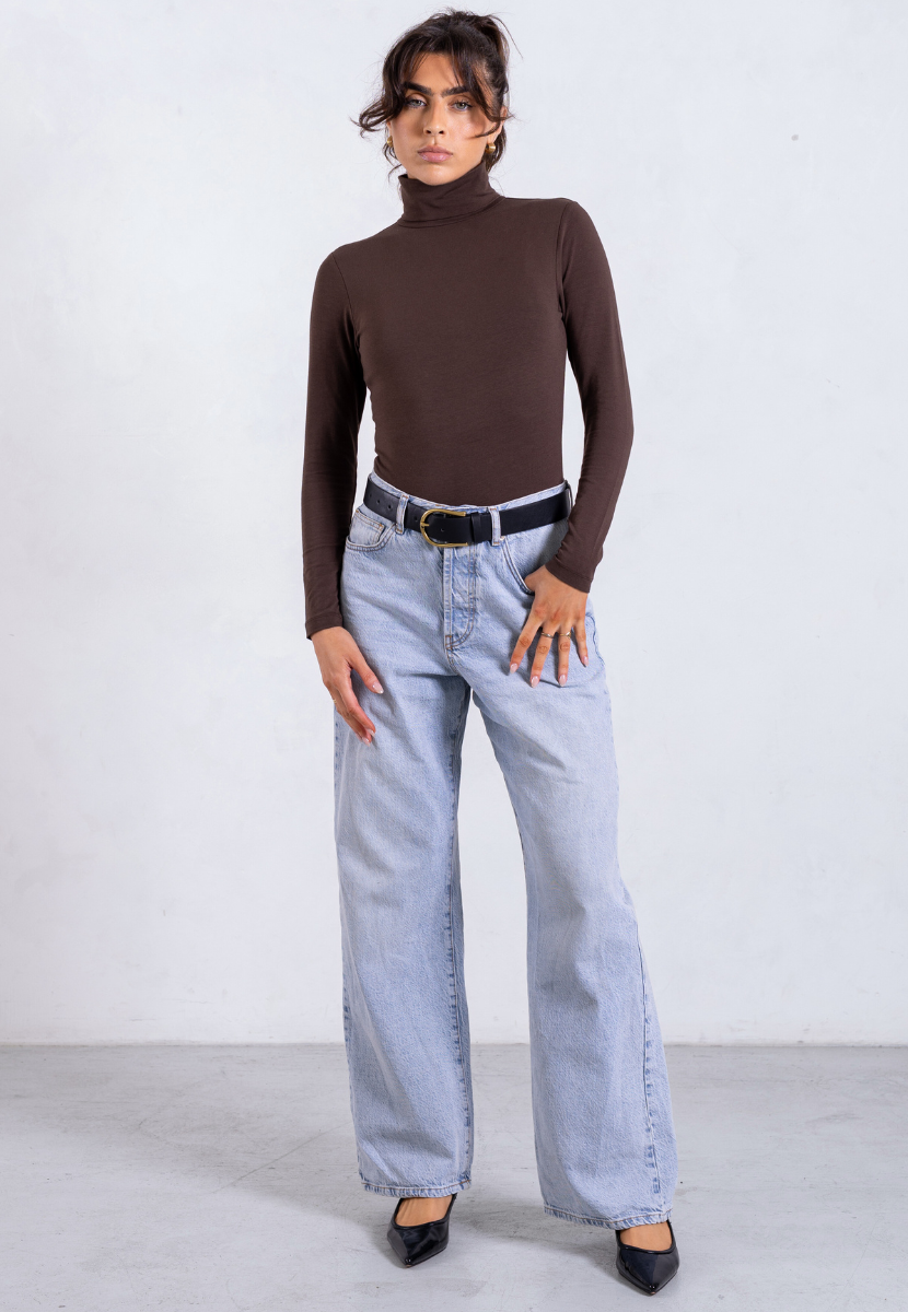 styled image of brown organic cotton roll neck long sleeve bodysuit