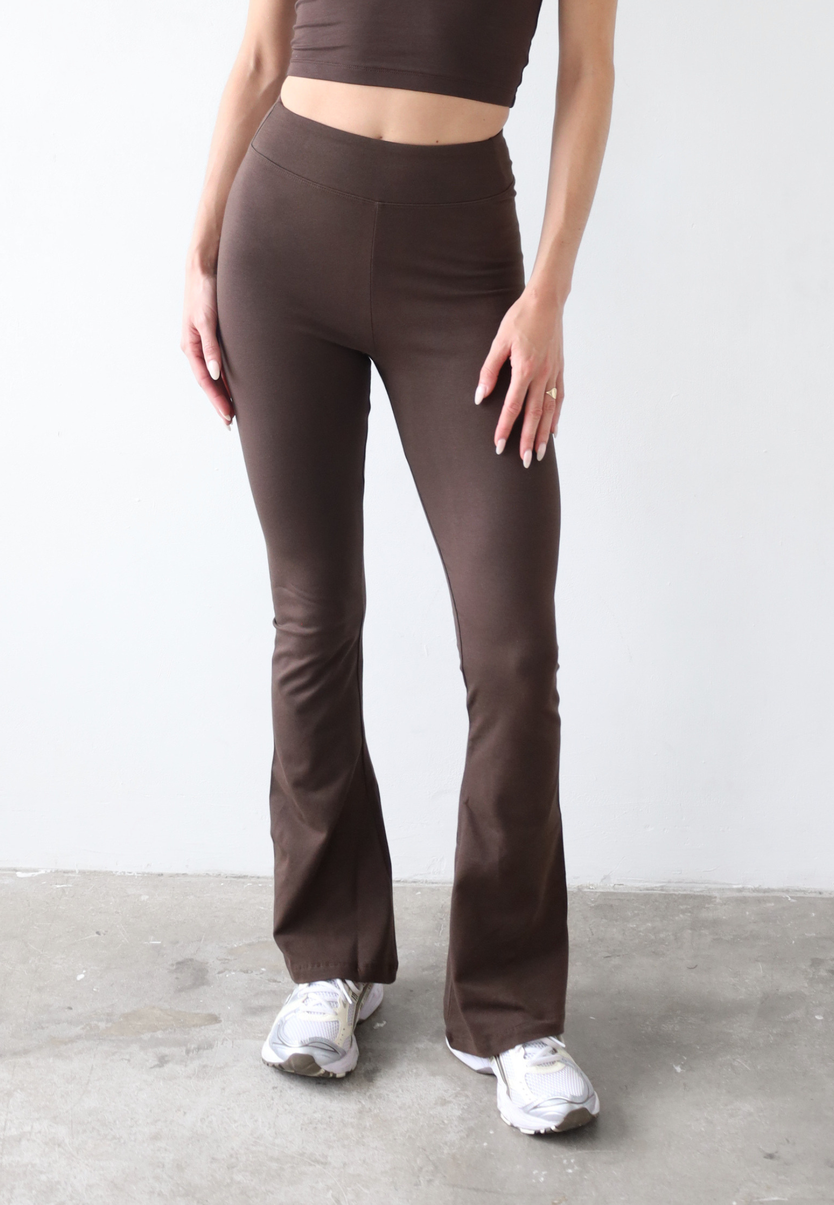 Organic cotton flared dark brown leggings, front