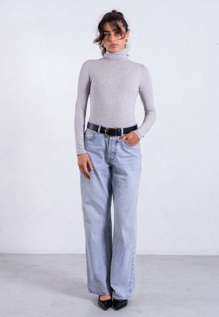 styled image of grey organic cotton roll neck long sleeve bodysuit