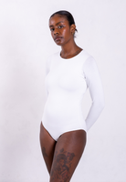 front of organic cotton long sleeve white crew neck bodysuit