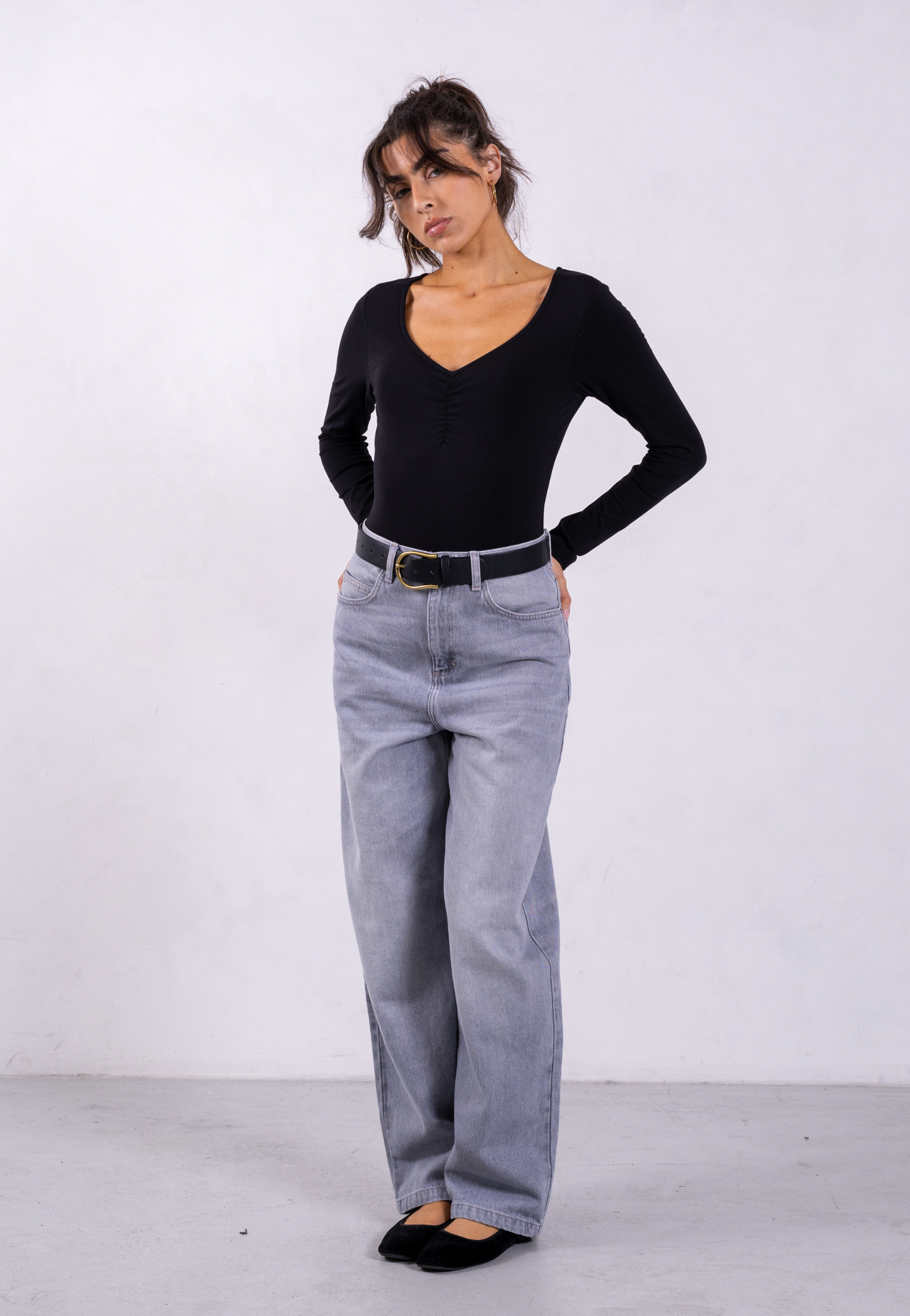 styled image of black organic cotton sweetheart bodysuit